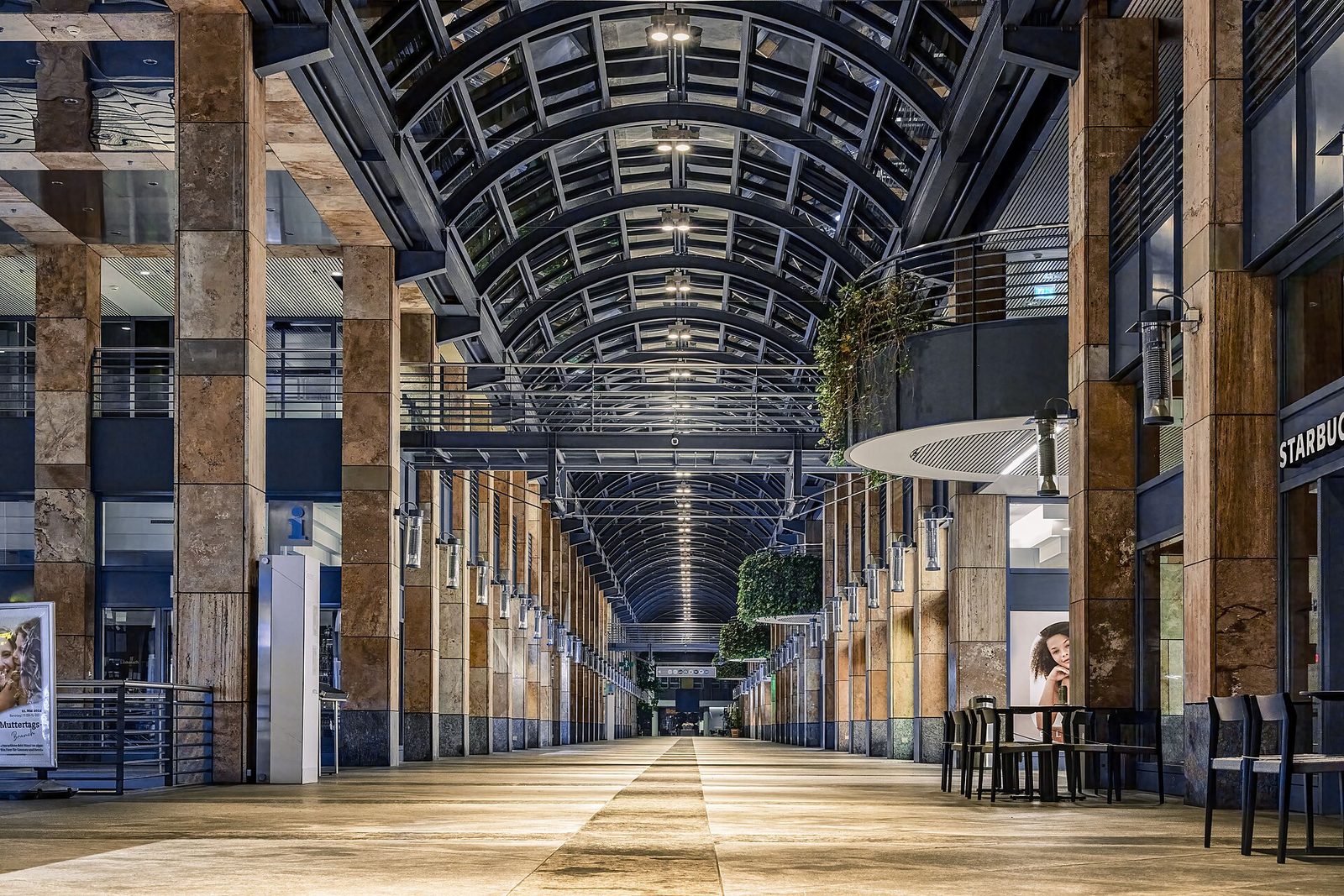 The interior gallery of a shopping arcade.
